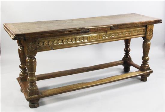 An early 18th century Spanish walnut draw leaf table, 10ft 5in. x 1ft 10in. x 2ft 6in.